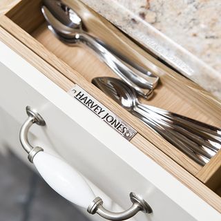kitchen room with spoon in cutlery drawers
