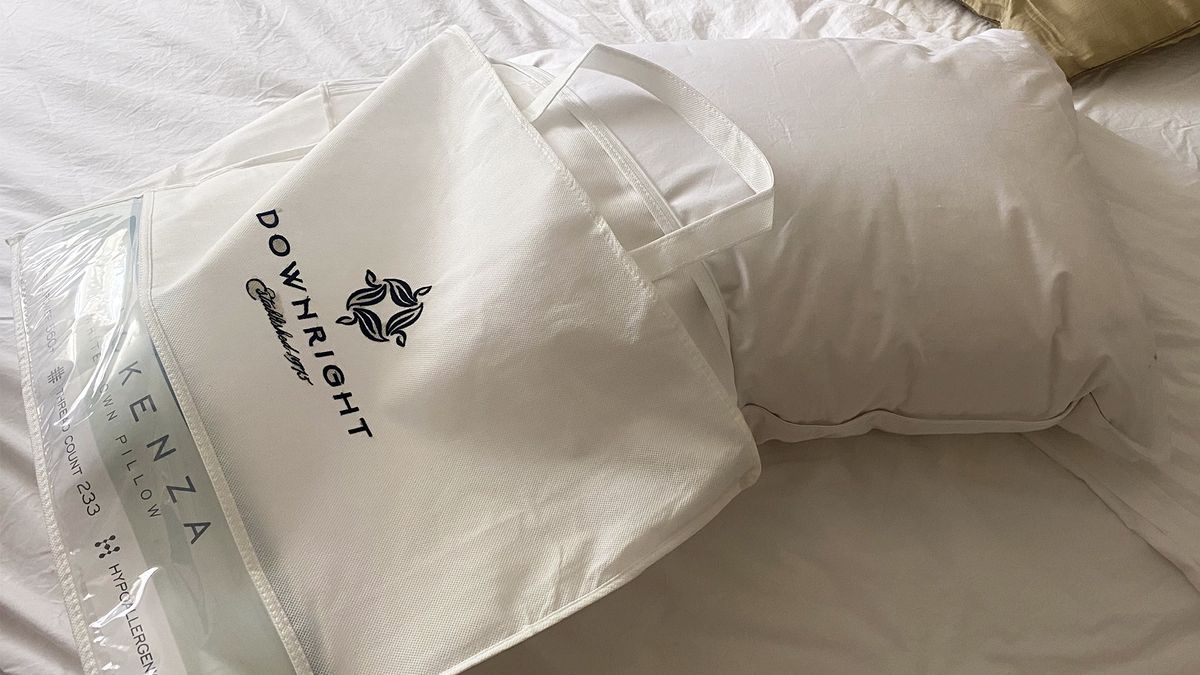 The Downright Mackenza WD pillow being partly removed from the bag