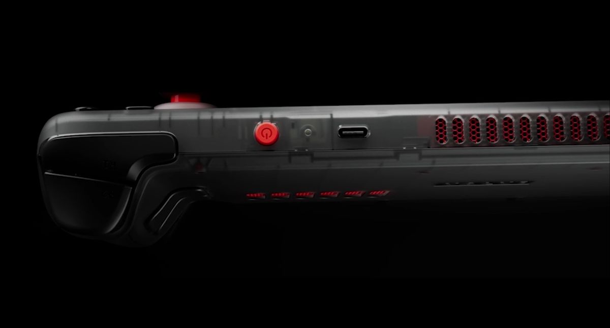Limited edition steam deck oled with smoky clear plastic shell and orange highlight buttons