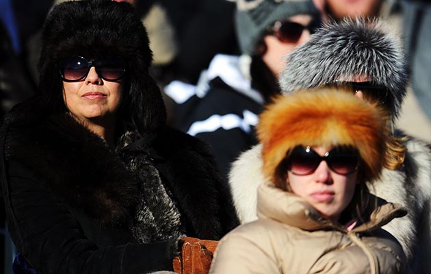 Glitz and glamour: fur-clad spectators soak up the atmosphere