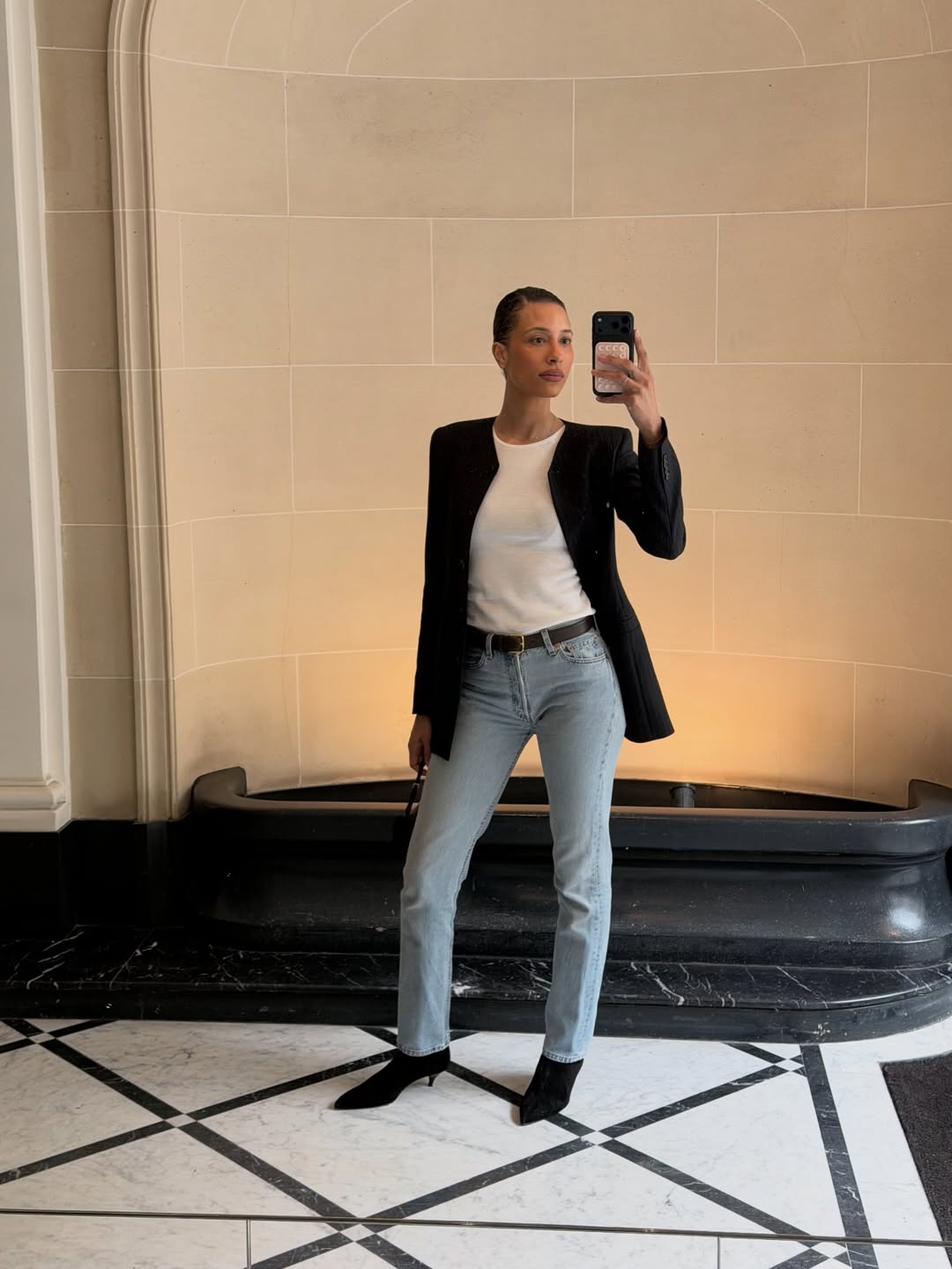 TyLynn in light-wash jeans