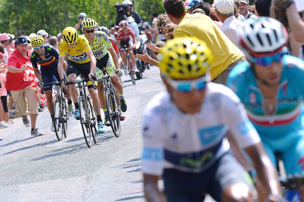 Chris Froome chases down Nairo Quintana during stage 14.