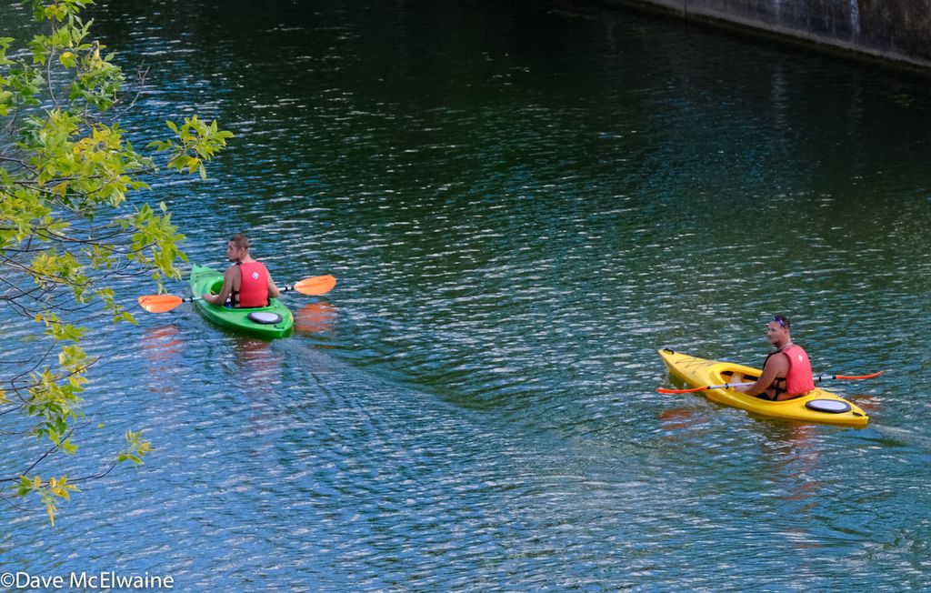 Kayakers watch the race from the Erie Canal