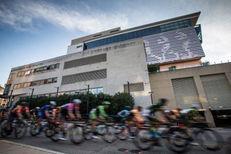 The men pass by the Mohammad Ali Center in Louisville
