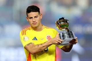 James Rodriguez with his Player of the Tournament award after Colombia's loss to Argentina in the final of the 2024 Copa America.