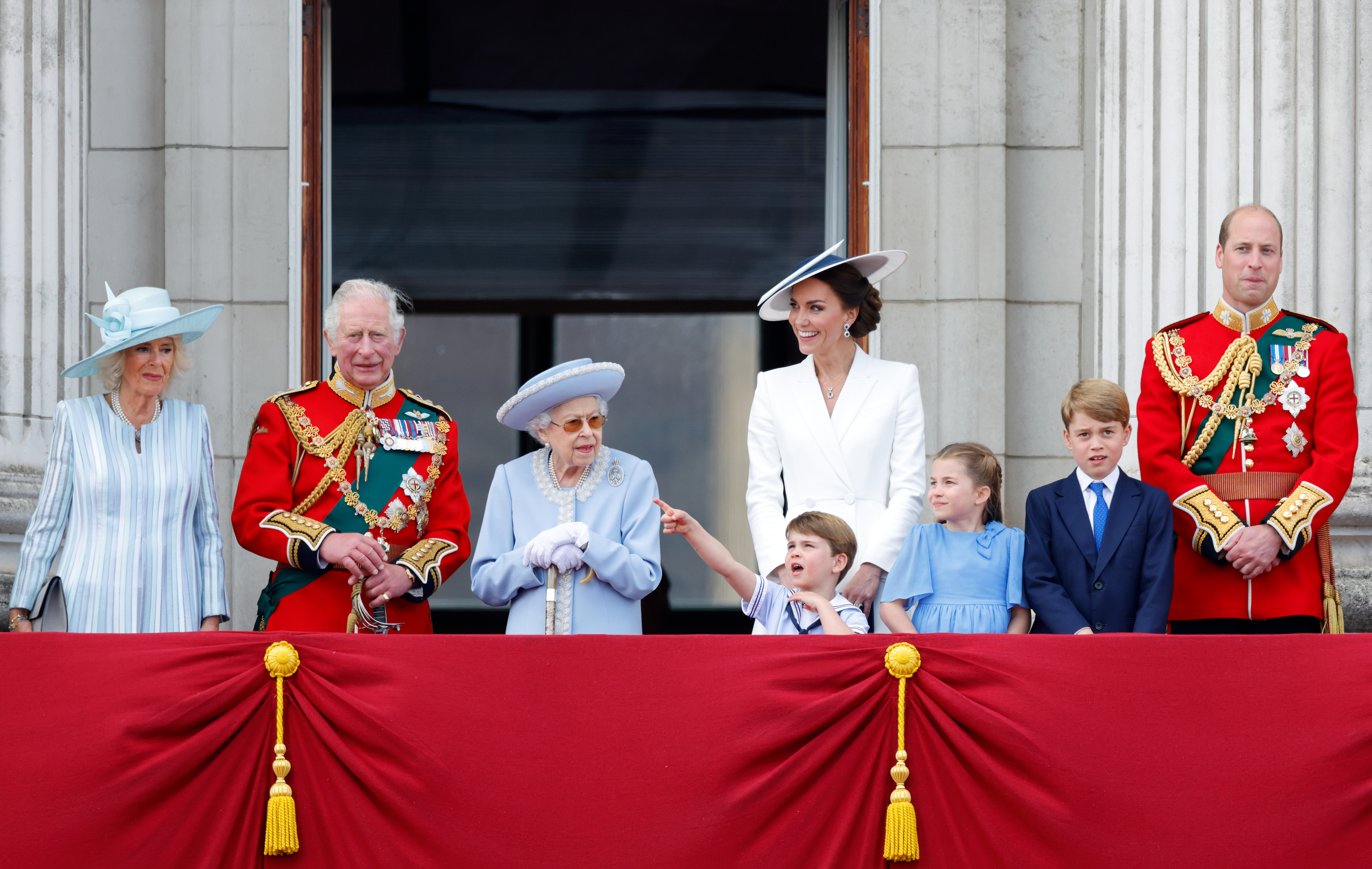 Queen Elizabeth standing on the Buckingham Palace balcony with King Charles, Queen Camilla, Prince William, Princess Kate, Prince George, Princess Charlotte and Prince Louis