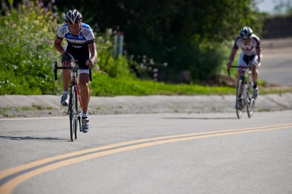 Riders getting up the climb as hard as they can