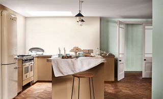 kitchen with contemporary yet retro feel painted in dulux paint with gorgeous wooden units and kitchen island