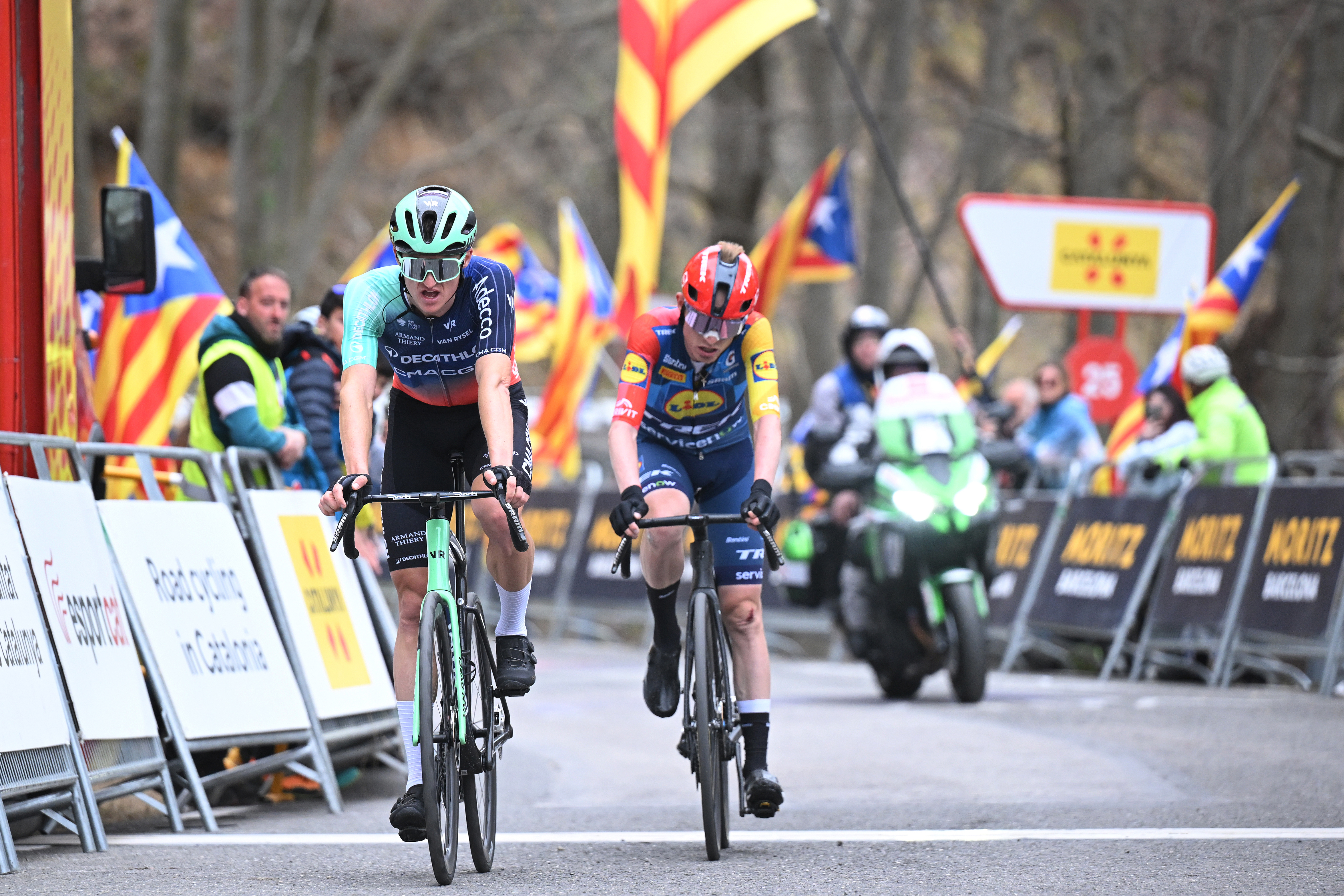 QUERALT, SPAIN - MARCH 28: (L-R) Felix Gall of Austria and Team Decathlon CMA CGM and Mattias Skjelmose of Denmark and Team Lidl - Trek cross the finish line during the 105th Volta a Catalunya 2026, Stage 6 a 158.2km stage from La Berga to Queralt 1133m / #UCIWT / on March 28, 2026 in Queralt, Spain. (Photo by Szymon Gruchalski/Getty Images)