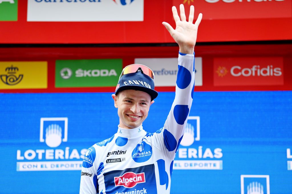 ALICANTE SPAIN AUGUST 30 Jay Vine of Australia and Team AlpecinDeceuninck celebrates winning the Polka dot mountain jersey on the podium ceremony after the 77th Tour of Spain 2022 Stage 10 a 309km individual time trial stage from Elche to Alicante LaVuelta22 WorldTour on August 30 2022 in Alicante Spain Photo by Justin SetterfieldGetty Images