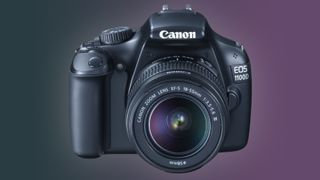 Canon EOS 1100D against a purple and dark green background