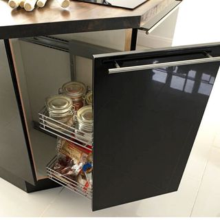 kitchen with storage unit and black cabinet