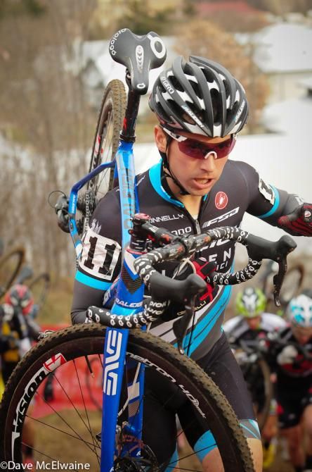 Allen Krughoff (Raleigh Clement) making the big climb with his bike shouldered