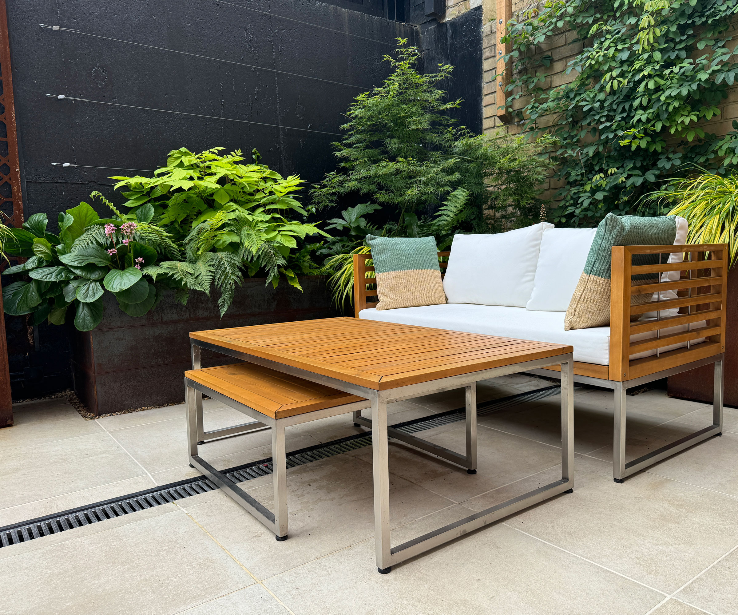 small patio with furniture and plants