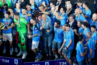 Napoli players celebrate their Scudetto win with coach Luciano Spalletti in June 2023.