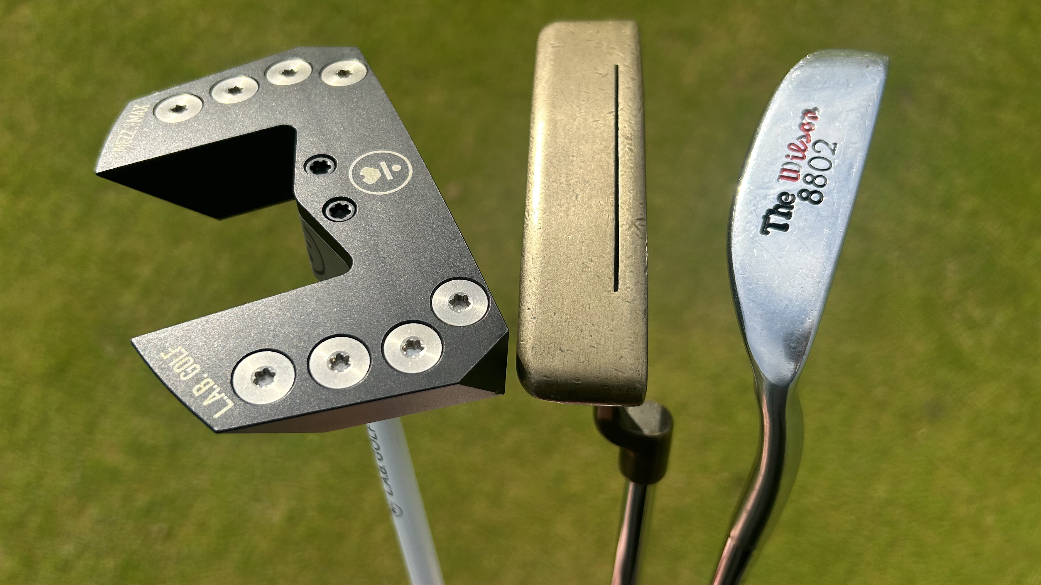 Photo of the three putters together