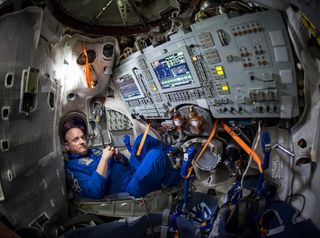 Scott Kelly Reclining in ISS