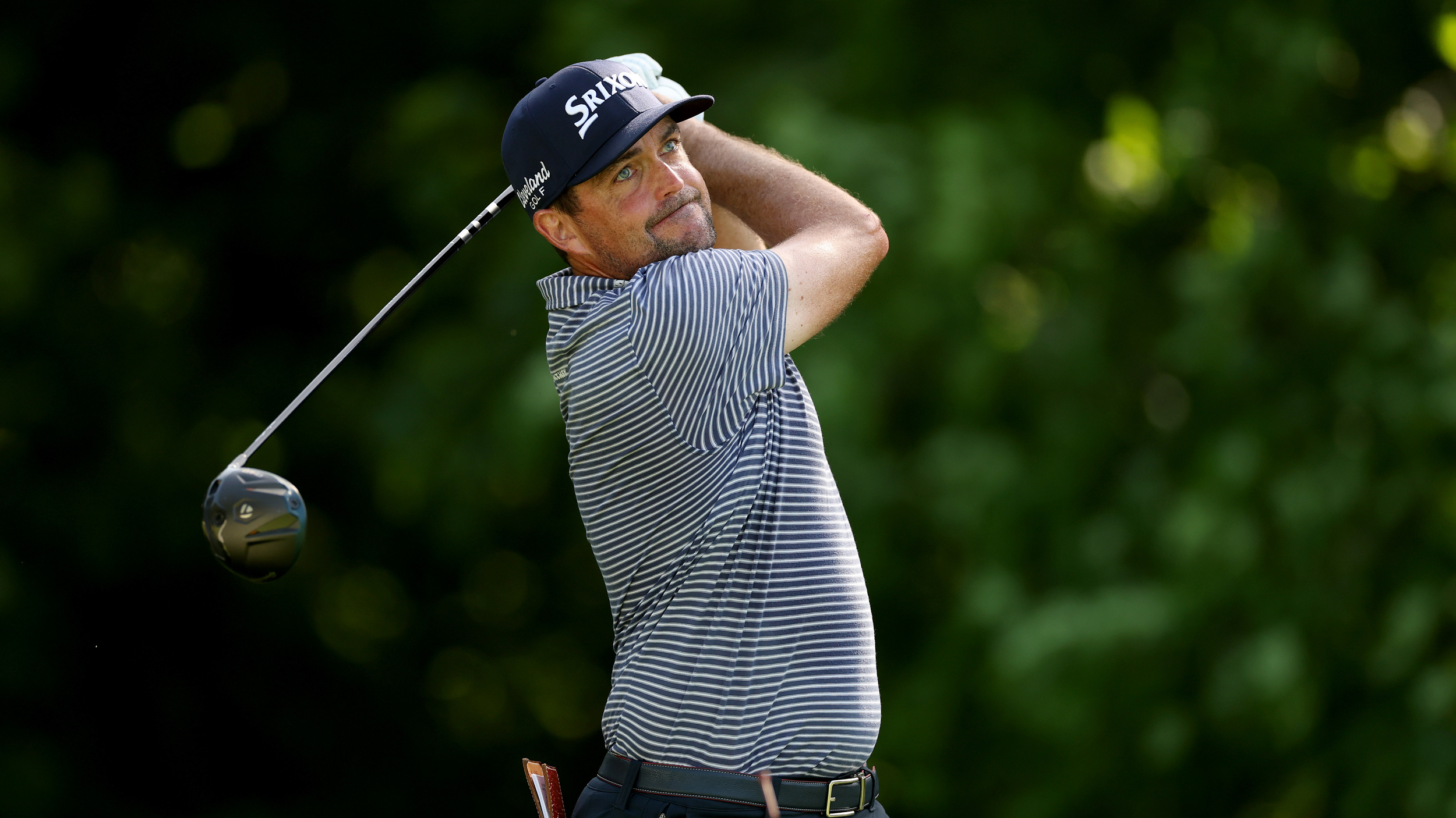 Keegan Bradley holds his finish on a drive