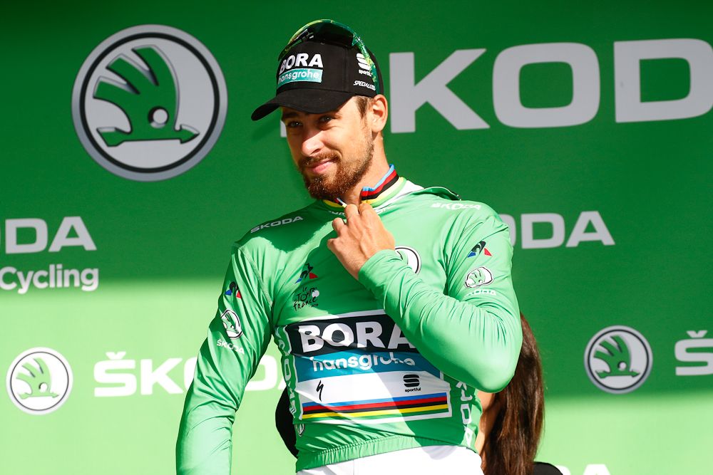 Peter Sagan on the podium in green following his stage 17 crash at the Tour de France