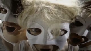 Three men in white masks in The European's music video for The Animal Song on Beavis and Butt-Head
