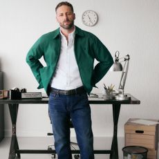 Male model wearing a green collared jacket and dark denim jeans sold at Jacamo