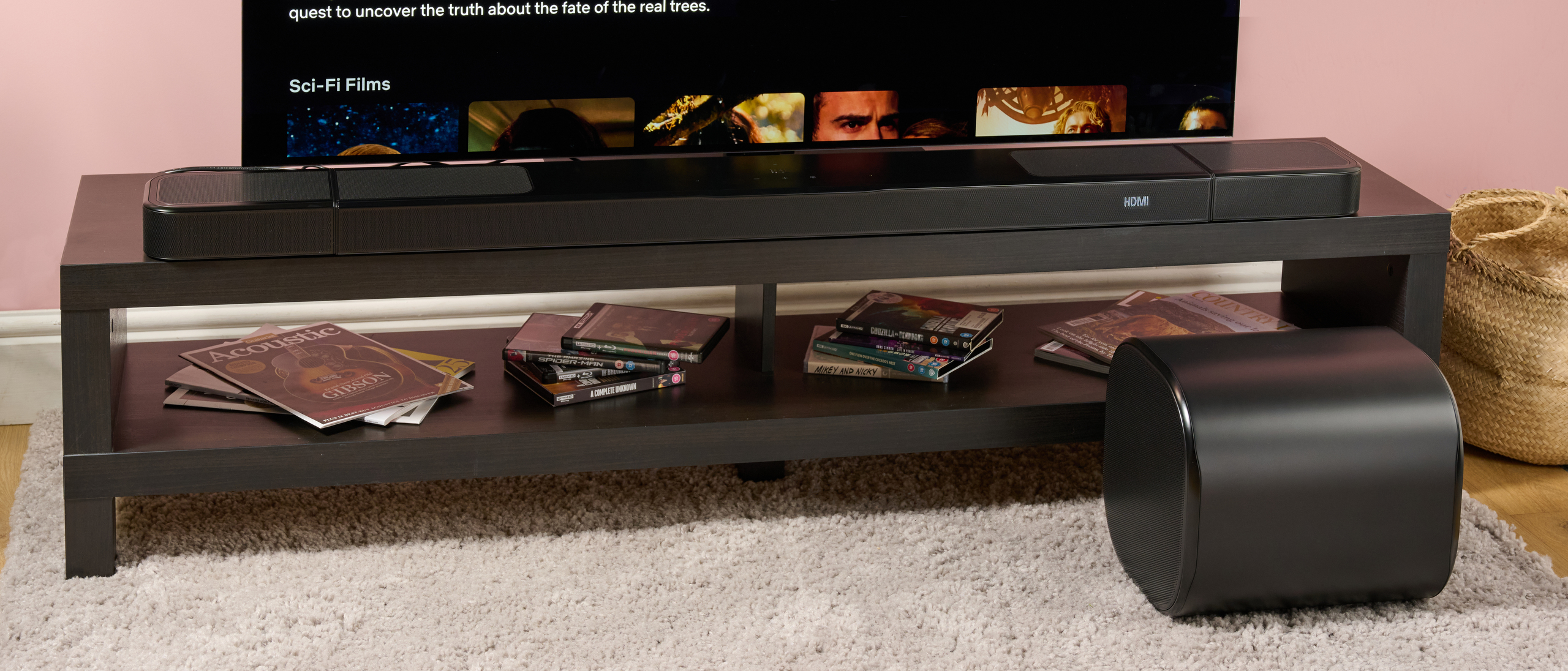 JBL Bar 1300MK2 soundbar surround speakers and sub alongside TV setup