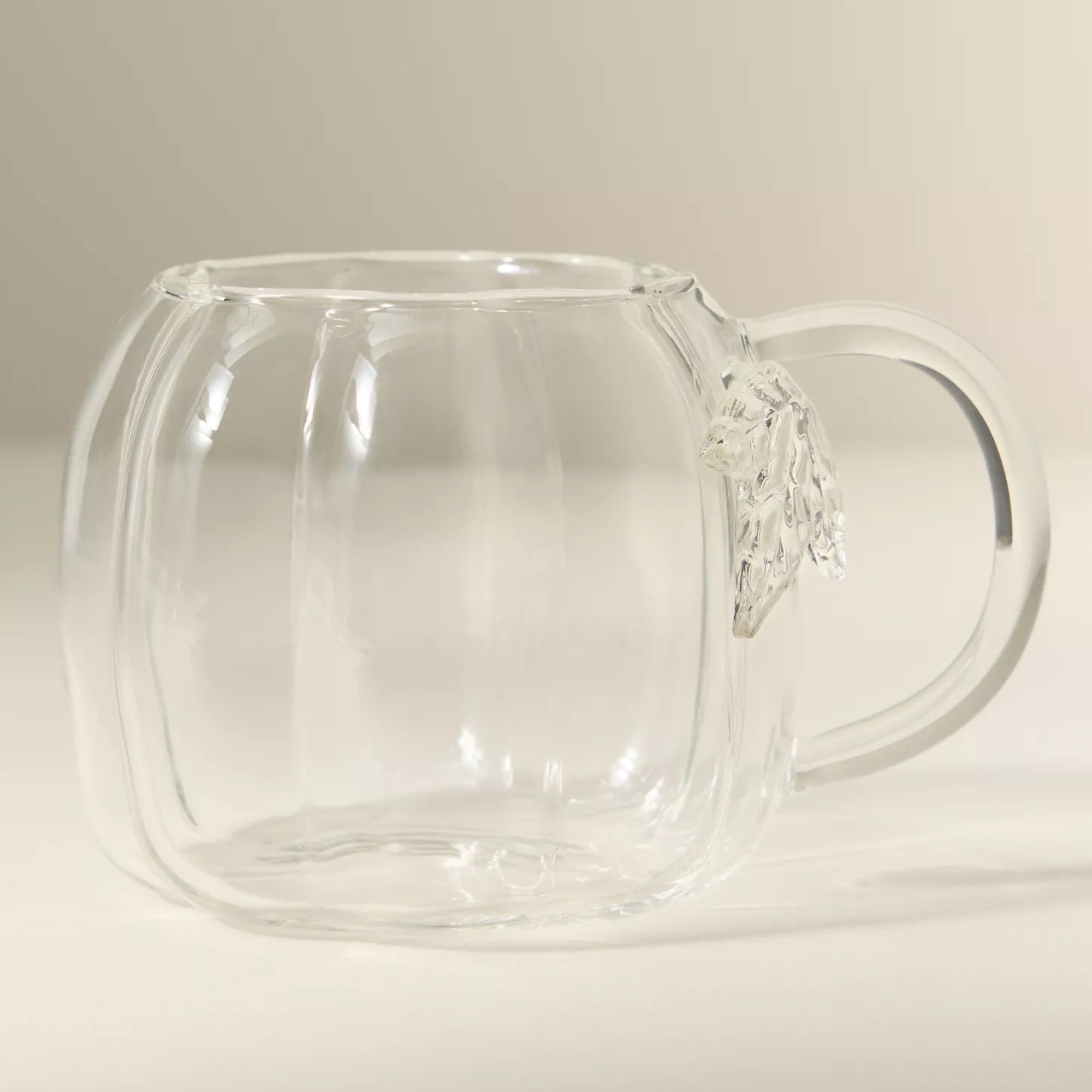 Glass mug in the shape of a pumpkin