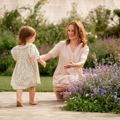 woman and child in garden