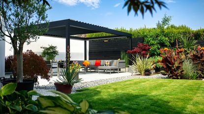 Roof ideas for pergolas – outdoor sofa on patio with caribbean blinds pergola