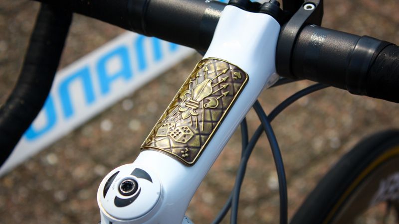 Gladatorial and gambling imagery mix on Cancellara's stem