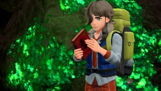 Arven from Pokemon Scarlet looking pensive in a forest