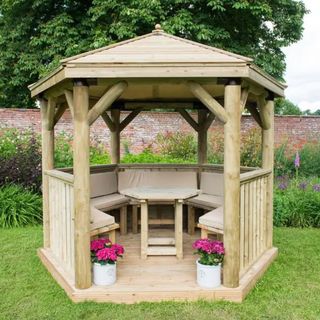 wooden gazebo with base and closed half sides and roof