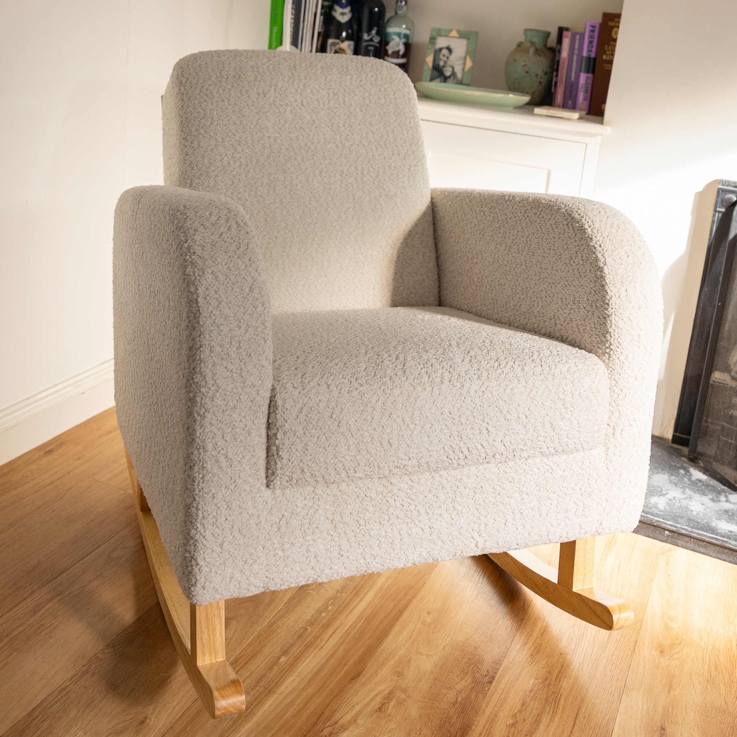 The CuddleCo Etta nursing chair in a living room