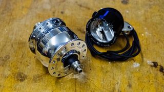 A polished SON dynamo hub and front light