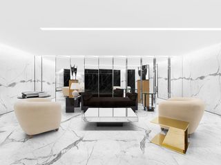 Mirrored panels and vast slabs of 'noir soie' and 'blanc statuaire' marble span the walls and floors