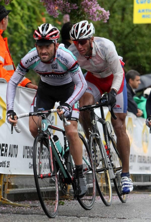 Riders jump away in the rain