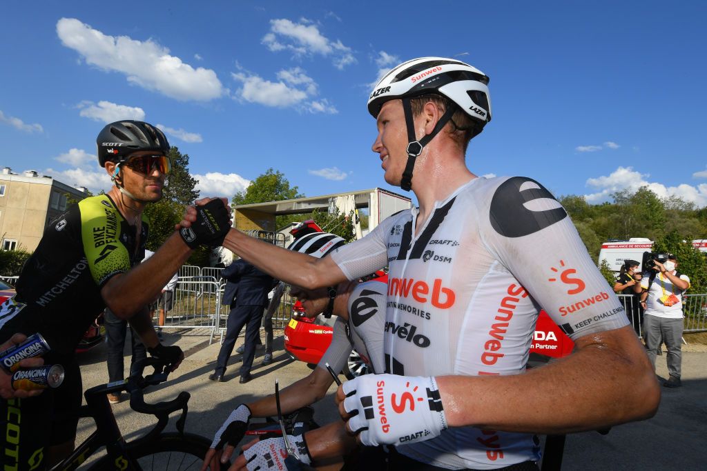 CHAMPAGNOLE FRANCE SEPTEMBER 18 Arrival Soren Kragh Andersen of Denmark and Team Sunweb Jack Bauer of New Zealand and Team Mitchelton Scott Celebration during 107th Tour de France 2020 Stage 19 a 1665km stage from Bourg en Bresse to Champagnole 547m TDF2020 LeTour on September 18 2020 in Champagnole France Photo by Stephan Mantey PoolGetty Images