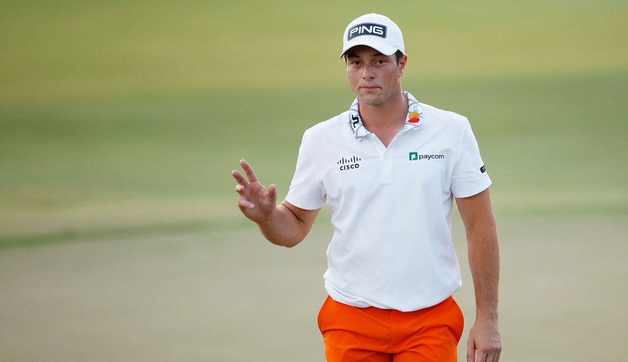 Viktor Hovland waves the crowd