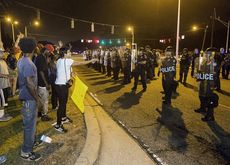 Protesters and police officers in Baton Rouge, Louisiana.