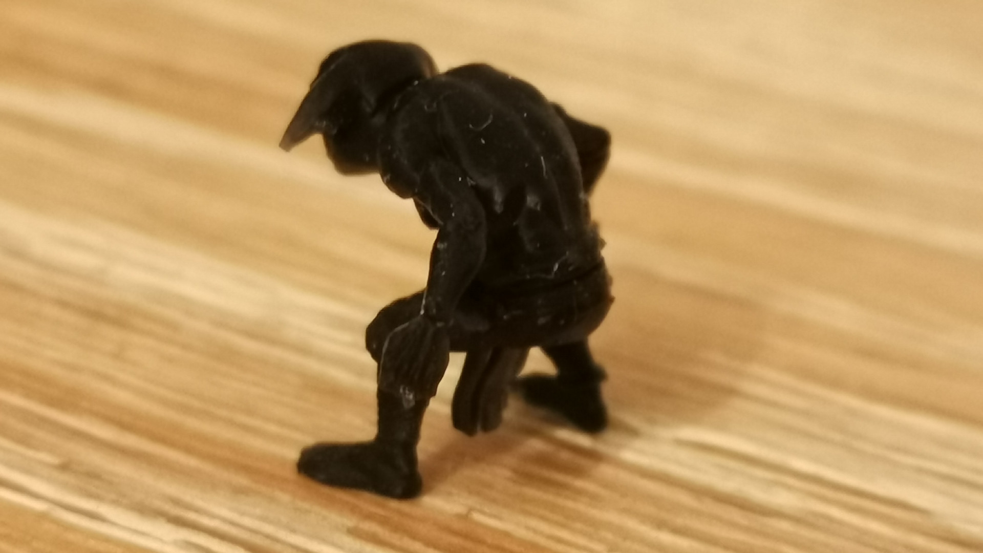 A tiny goblin figurine printed on the Elegoo Saturn