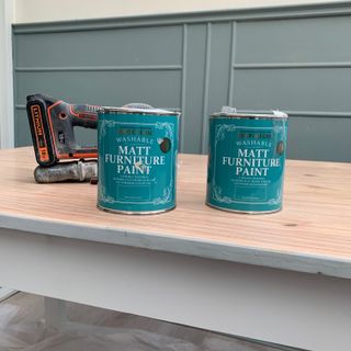 Two tubs of Rustoleum paint