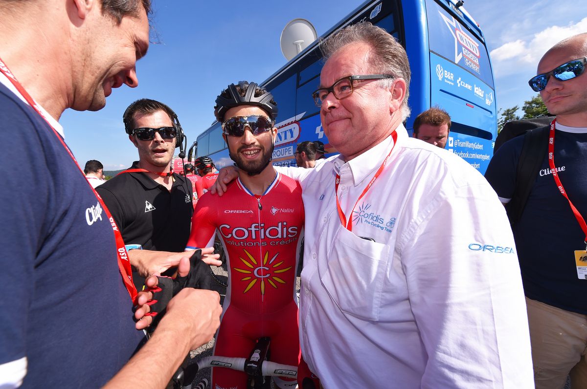 Cofidis manager Yvon Sanquer with sprinter Nacer Bouhanni at the team bus
