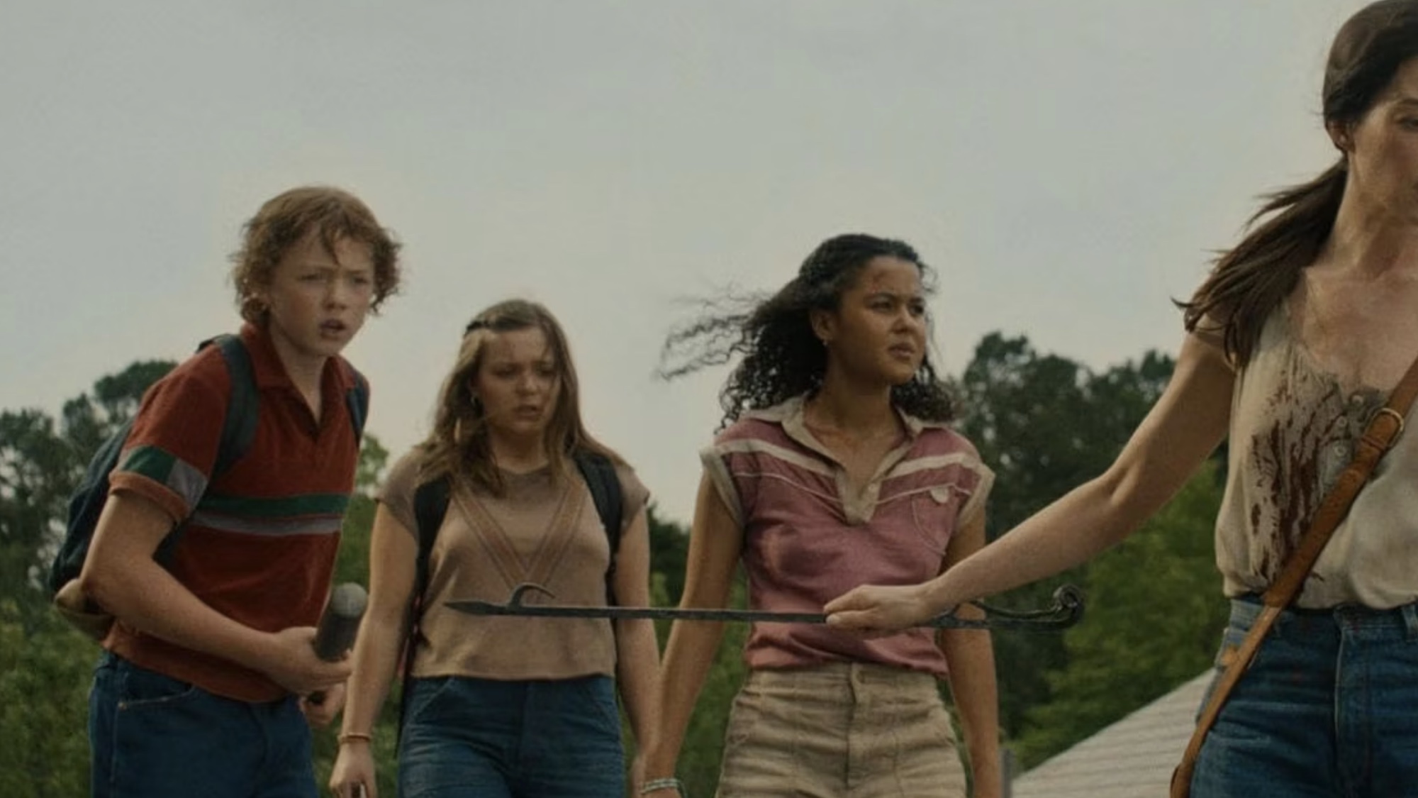 The three kids from The End of Oak Street on the roof.