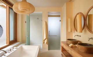 Hotel bathroom with wooden washbasin