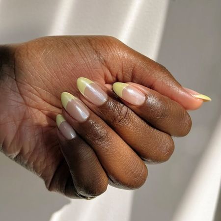 Sunny French tip nails.