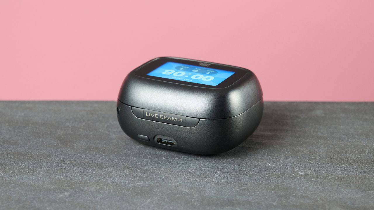 JBL Live Beam 4 smart charging case on table
