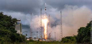 An Arianespace Soyuz rocket built in Russia launches 34 OneWeb satellites into orbit from the Guiana Space Center in Kourou, French Guiana on Feb. 10, 2022.