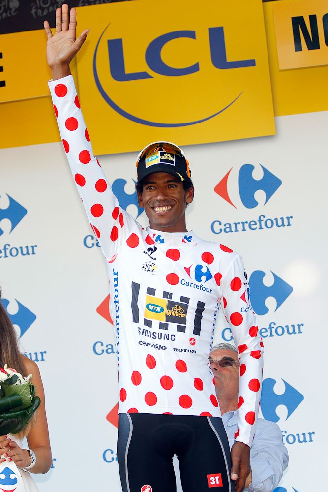 Daniel Teklehaimanot (MTN-Qhubeka) wears the polka dot jersey on the stage 6 podium.