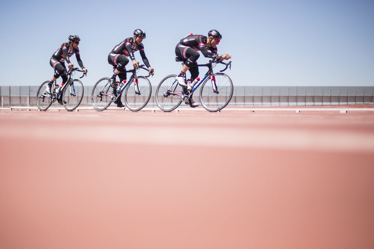 Marcel Kittel leads his Giant-Alpecin teammates on the athletics track