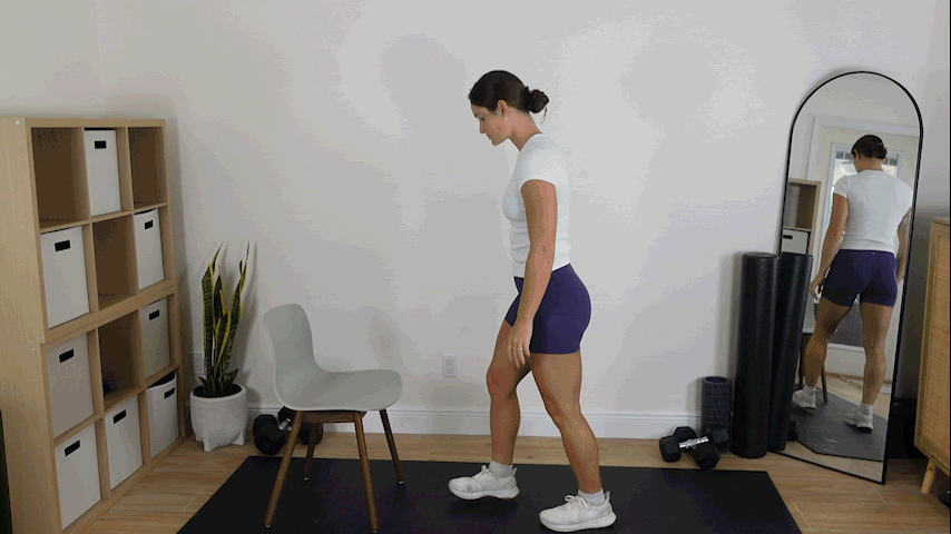 Trainer Kirra Mitlo performing a push up hold over a chair